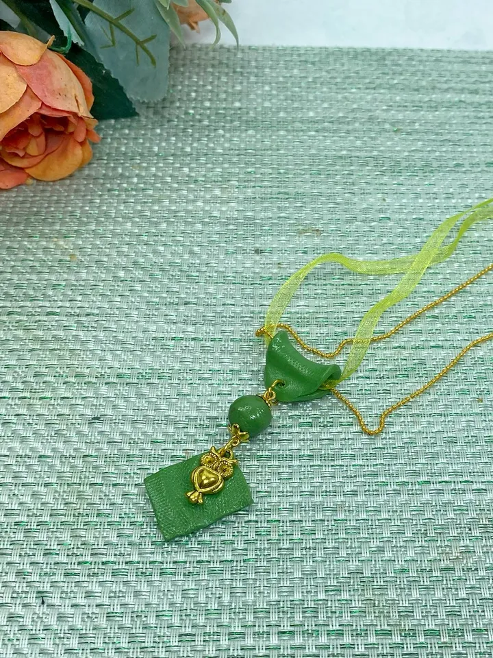 Handmade pendant on a chain. Handmade jewelry.