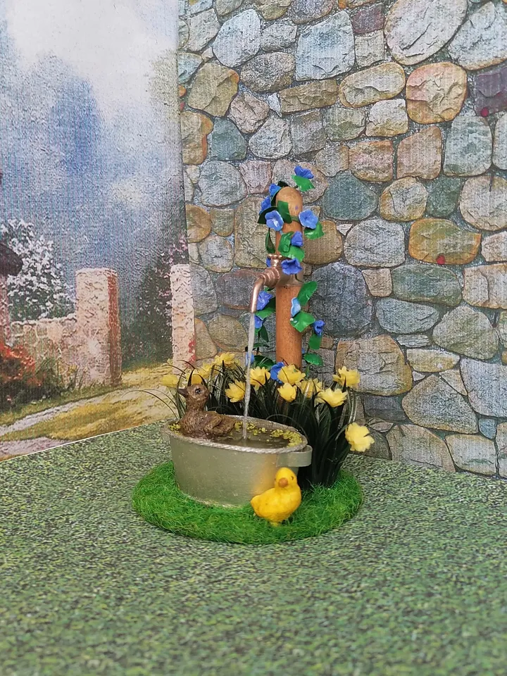 Composition for a puppet garden. Dollhouse miniature 1:12.
