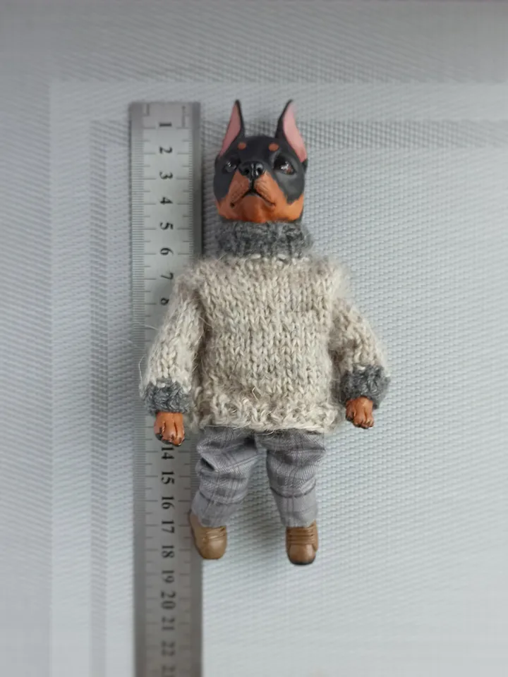 a doberman pinscher doll