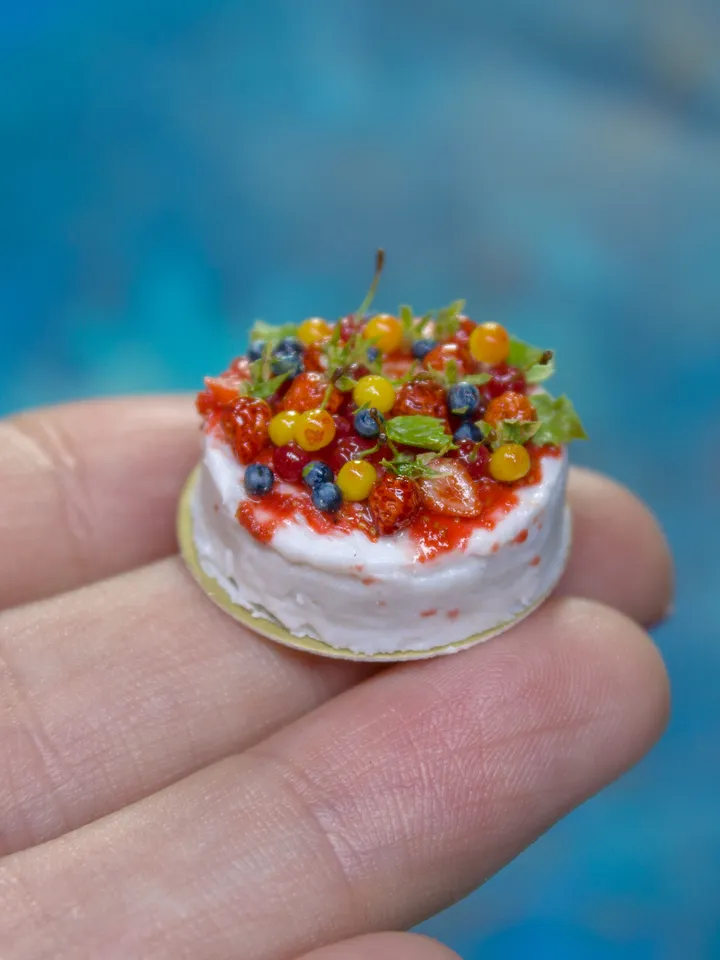 MINIATURE cake with berries on a gold cardboard stand 5