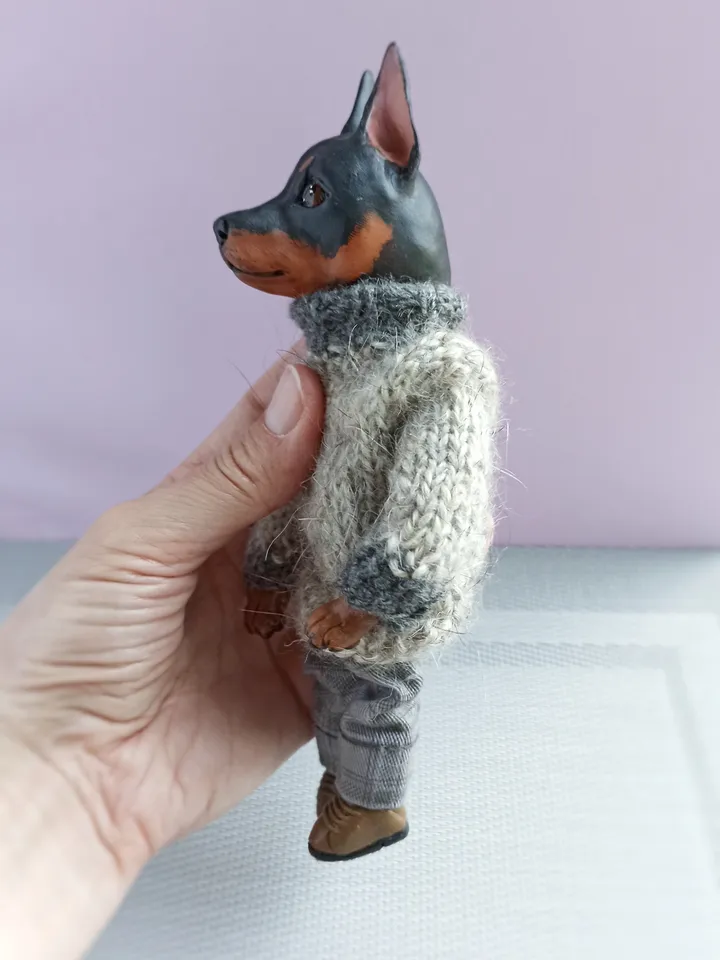 a doberman pinscher doll