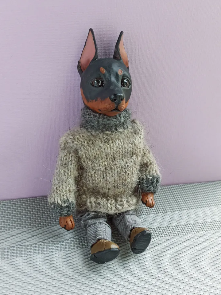 a doberman pinscher doll
