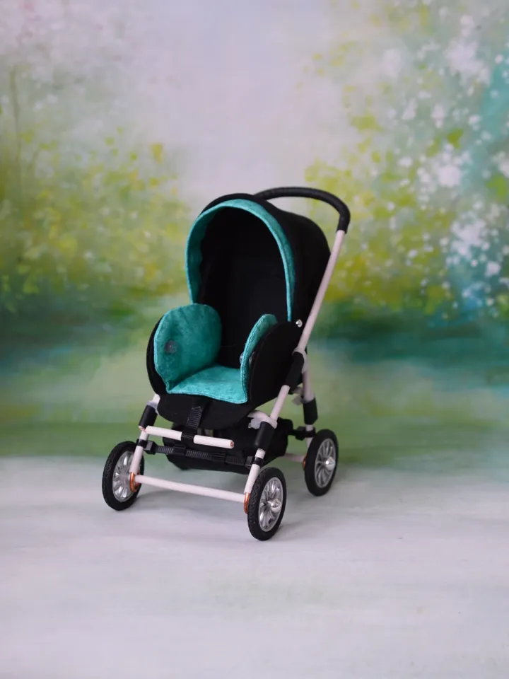 Miniature toy stroller for dolls in 1/6 scale. Accessories for small dolls and poupins. Pram for Barbie doll.