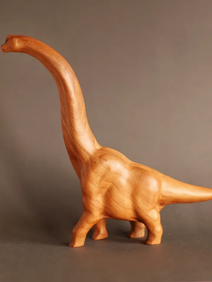 Wooden hand carved dinosaur brachiosaurus
