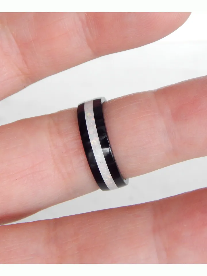 Stylish black ring. Carbon ring with synthetic opal. 8
