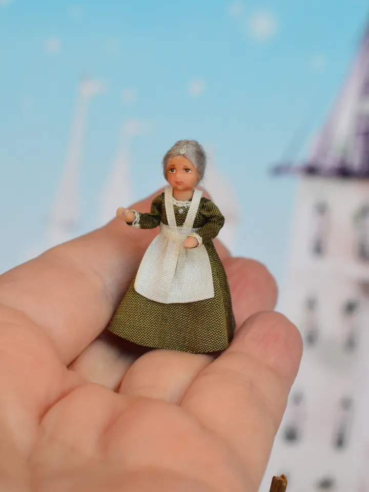 Miniature doll in the 48th scale. Grandmother for a dollhouse.