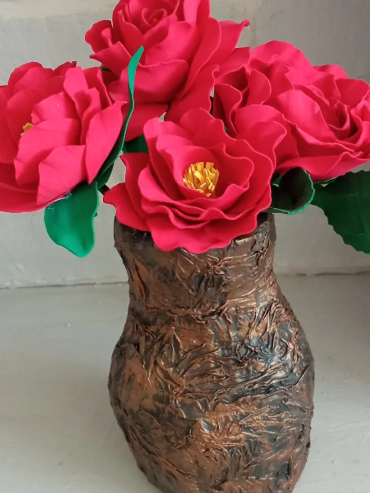 5 handmade red roses in a vase.