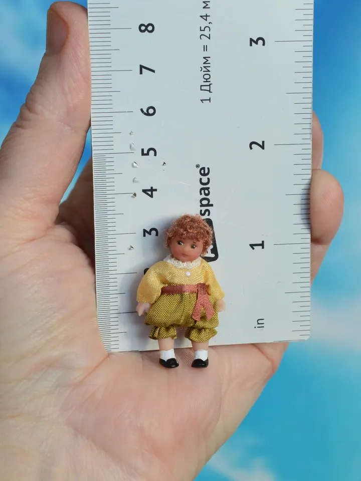 Miniature doll in 1/24 scale.  Doll toy to doll house.