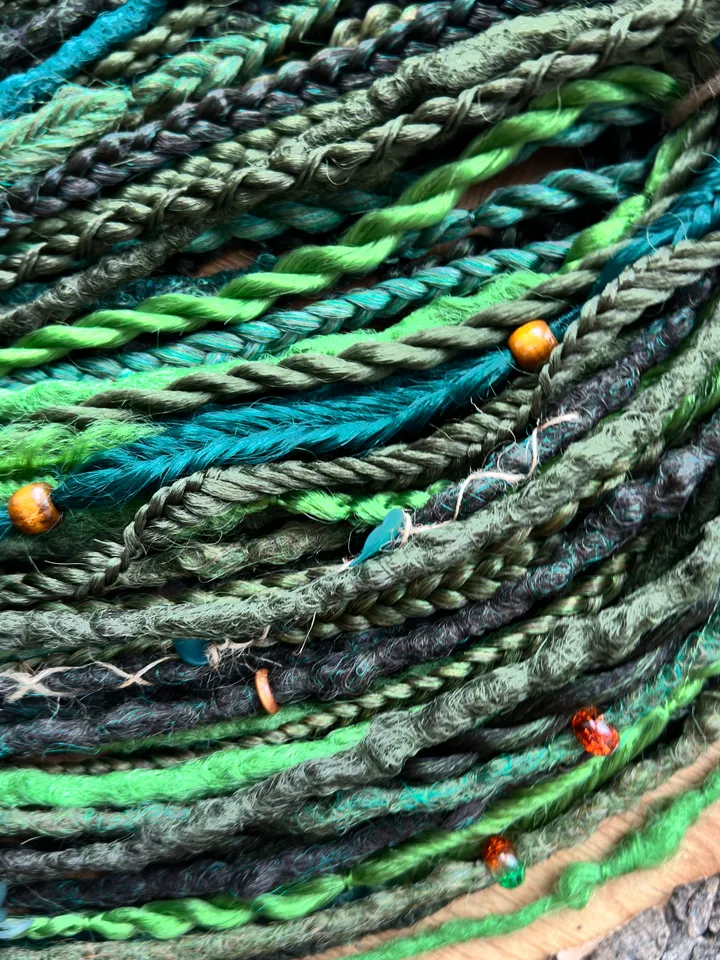 Dreads, green dreads and braids