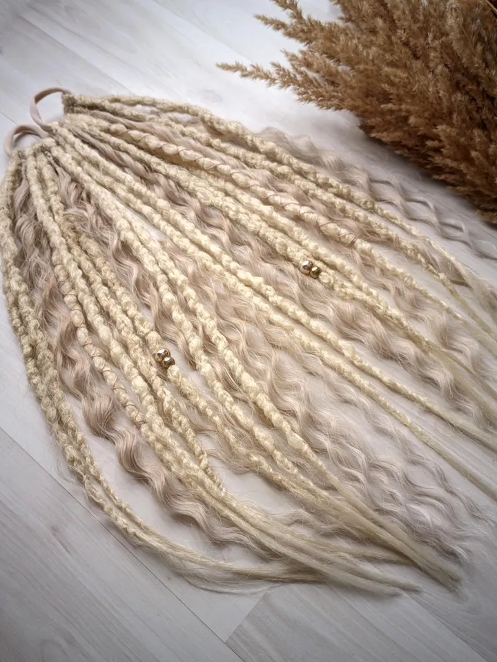 Blonde Dreads with Loose Waves on Elastic Hair Ties Featuring Curly Accents and Gold Beads for Boho Beach or Festival Styles