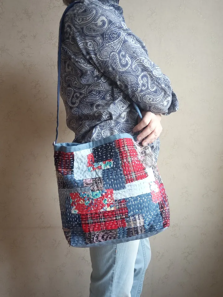 Pretty quilted handbag in the patchwork and boro style made of pieces of denim and cotton