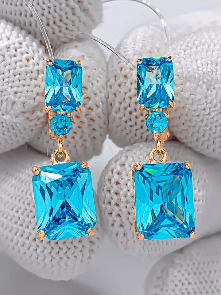 Earrings jewelry Silver gold plated 925 assay value with topaz, cubic zirconia blue
