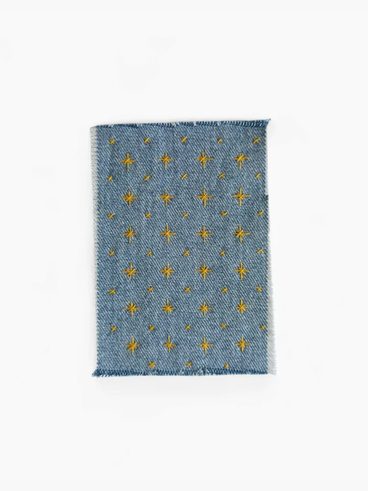 Sashiko patch hand sewn from recycled denim.