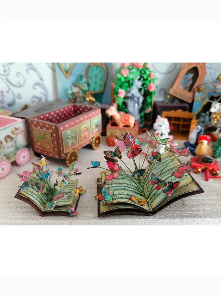 Miniature book with flying butterflies.1:12 scale.