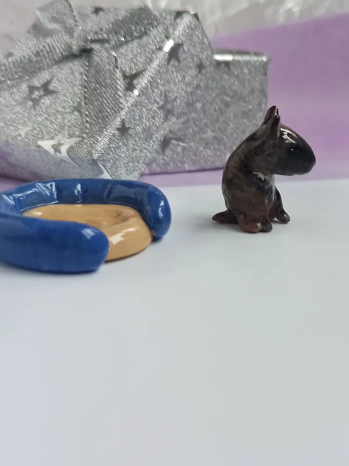 a brown bull terrier figurine (US discount)