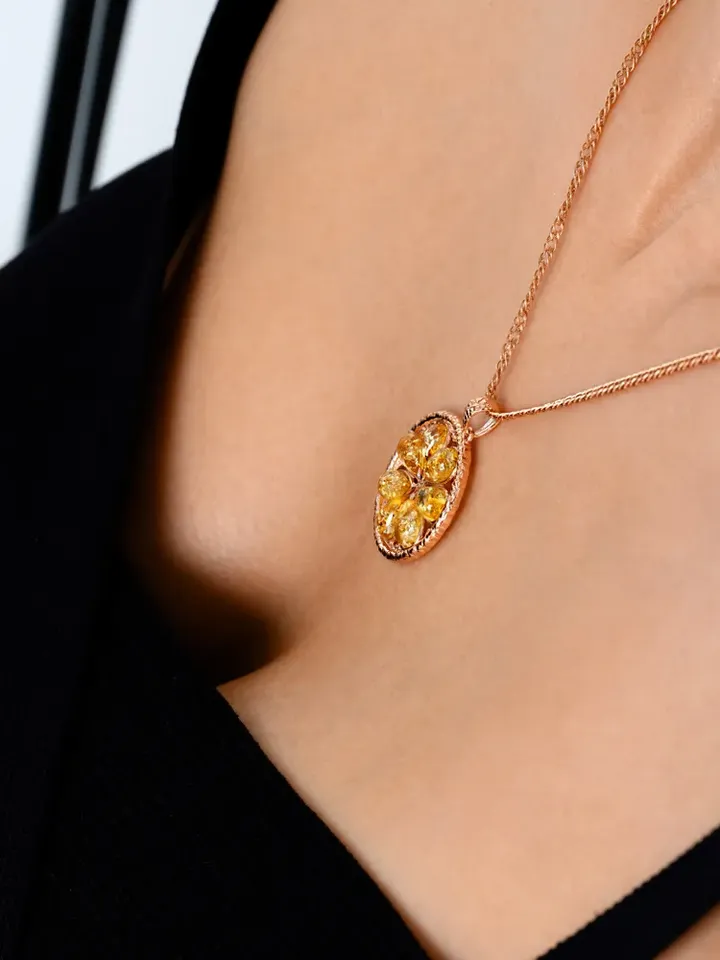 Jewelry pendant Lemons with natural Baltic amber made of 925 silver