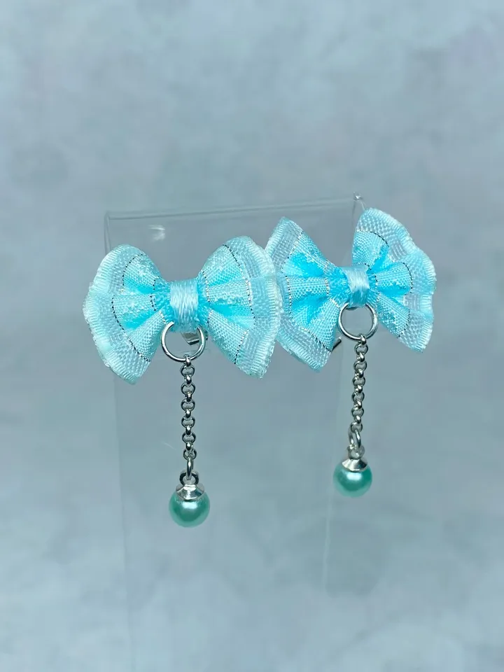 Handmade bow earrings. Author's work. Bright jewelry.
