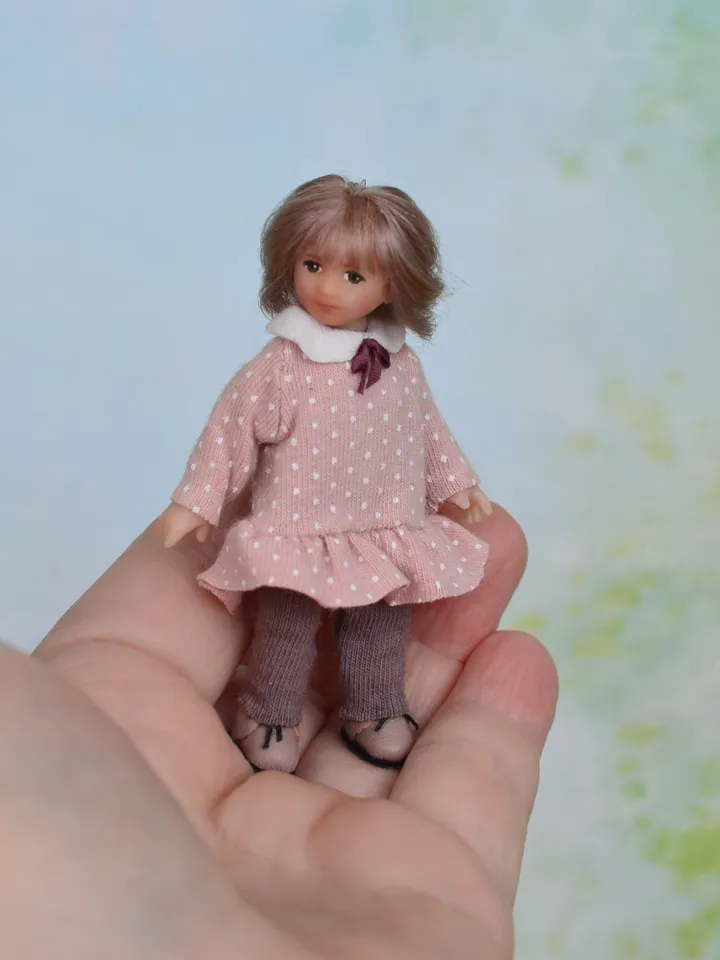 Miniature doll child in 12th scales