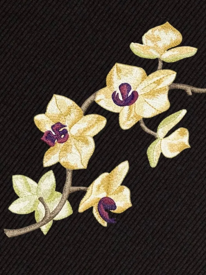 Orchid machine embroidery design using artistic satin stitch technique