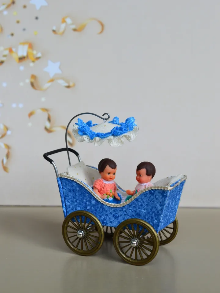 Miniature toy stroller for two small dolls. Handmade miniature stroller for small dolls.