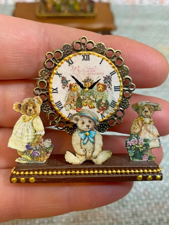 Imitation clock for a dollhouse. Scale 1:12.