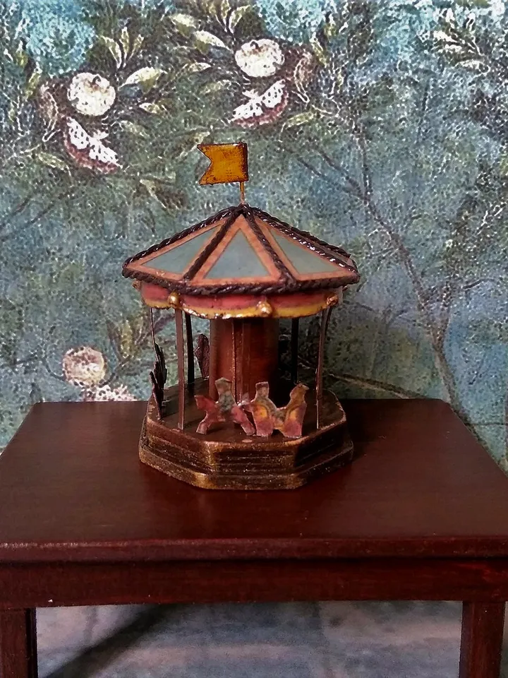 Miniature carousel. Dollhouse miniature.1:12 scale.