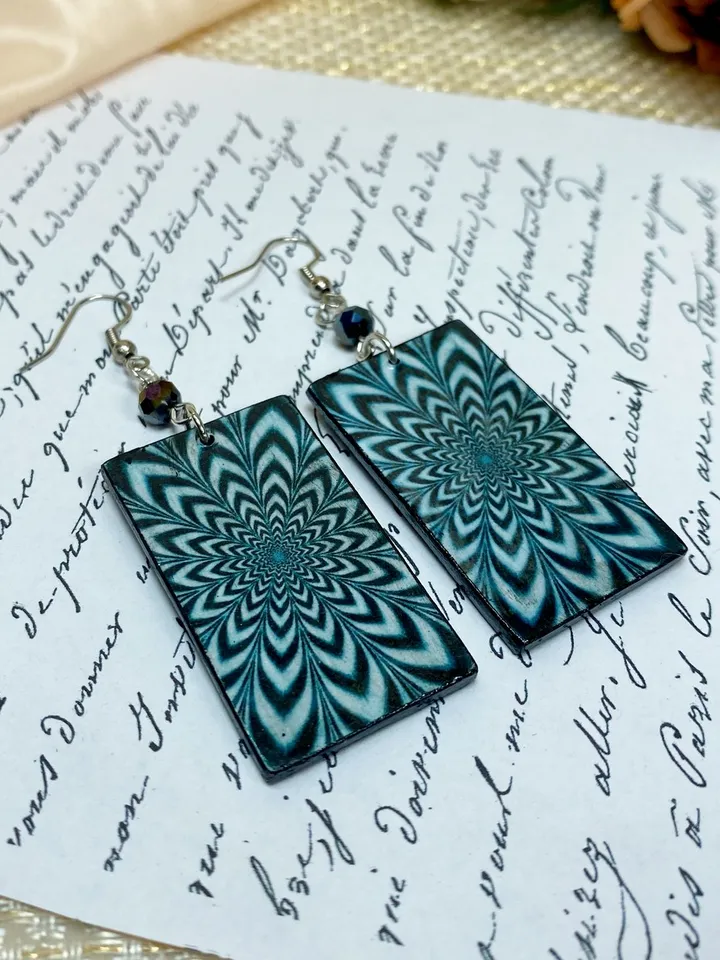 Handmade earrings. Optical illusion. Individual design.