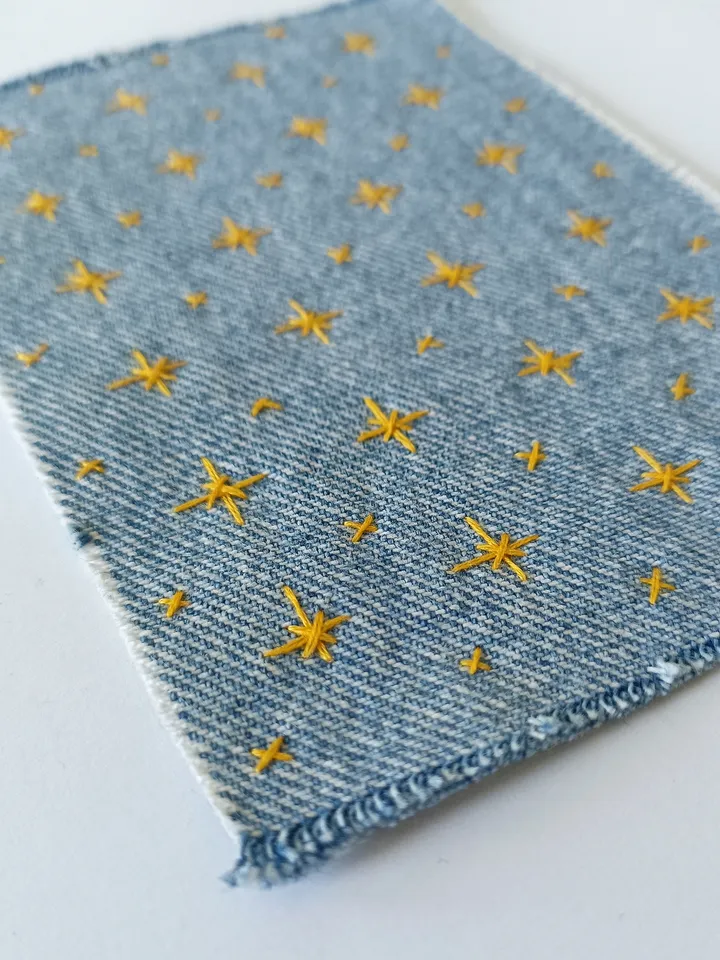 Sashiko patch hand sewn from recycled denim.