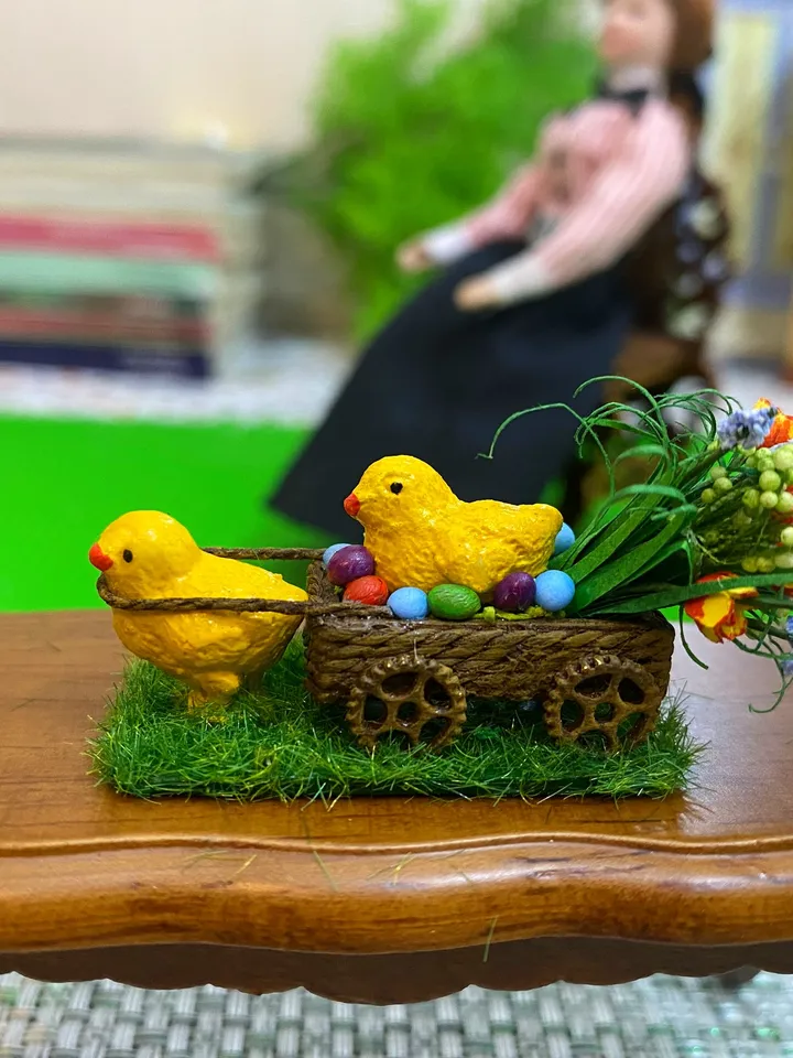 Easter miniature. Two chickens with a cart and a bouquet of flowers.1:12