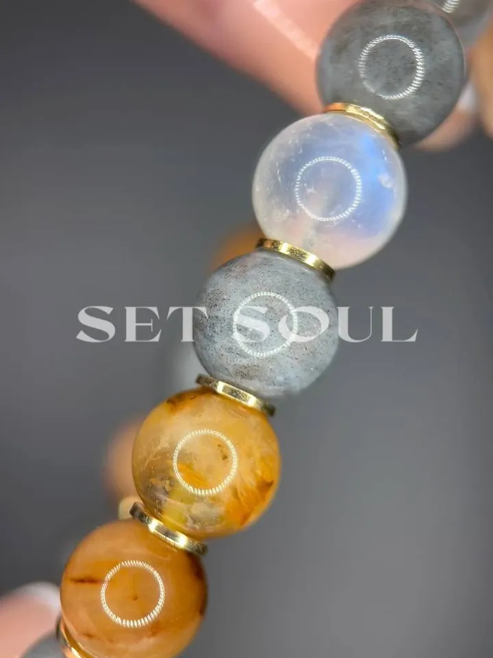 energy bracelet made of natural stones. Moonstone, labradorite, Himalayan azestulite