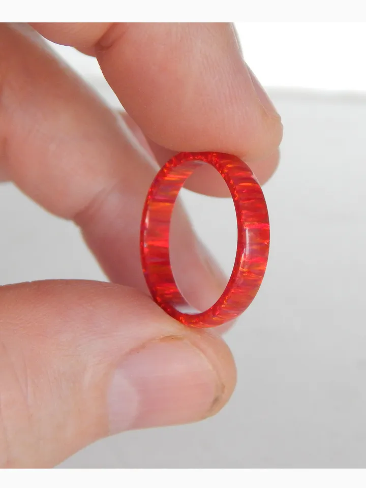 Very beautiful ring of opal. Solid opal band. Solid opal ring. Synthetic opal ring.