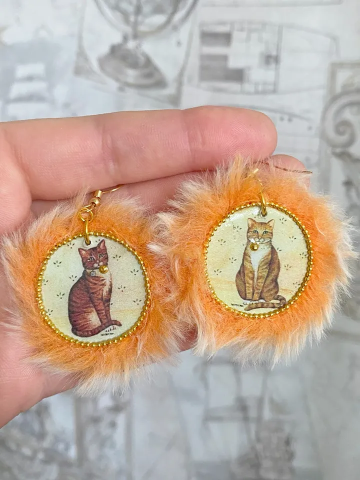 Cute handmade earrings. Image of cats, fur trim.