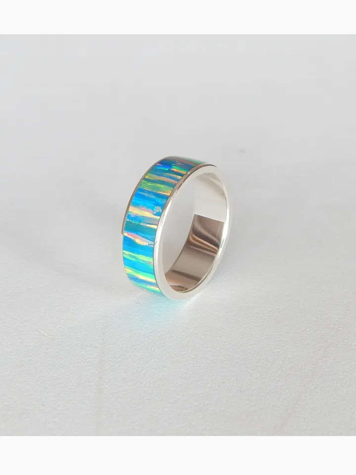 Silver ring with synthetic opal. Exclusive ring as a gift.