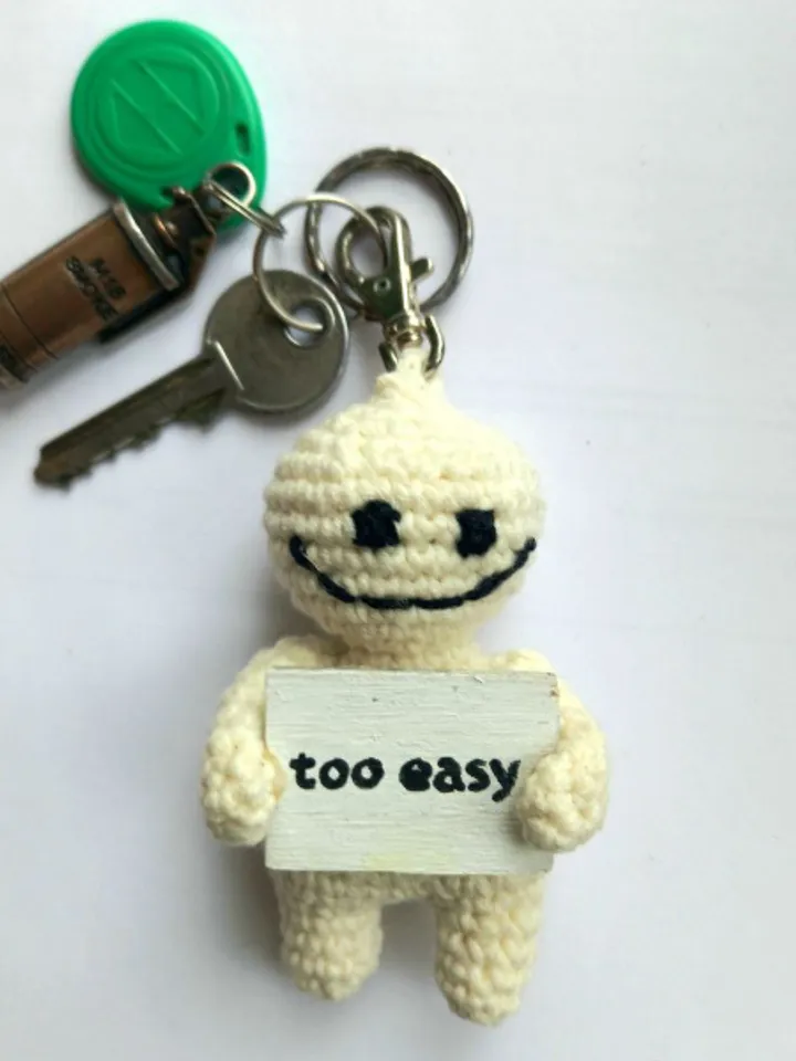 The keychain "too easy" for a bag or keys, a toy in the car interior, a pendant for the rearview mirror
