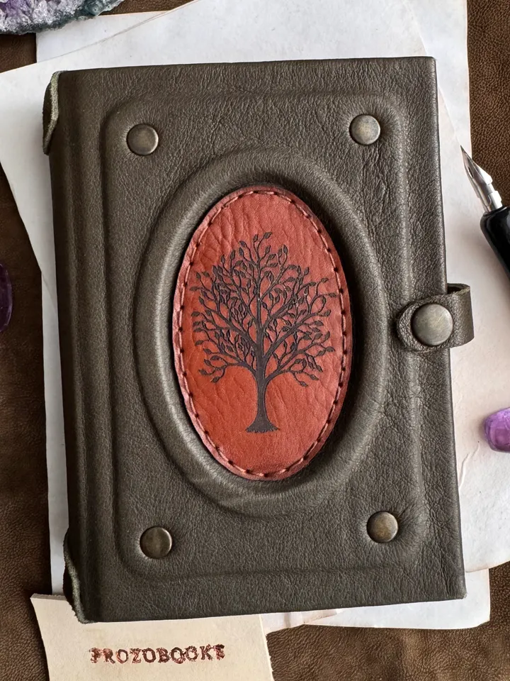 Notebook made of genuine suede with leather insert and wood engraving.