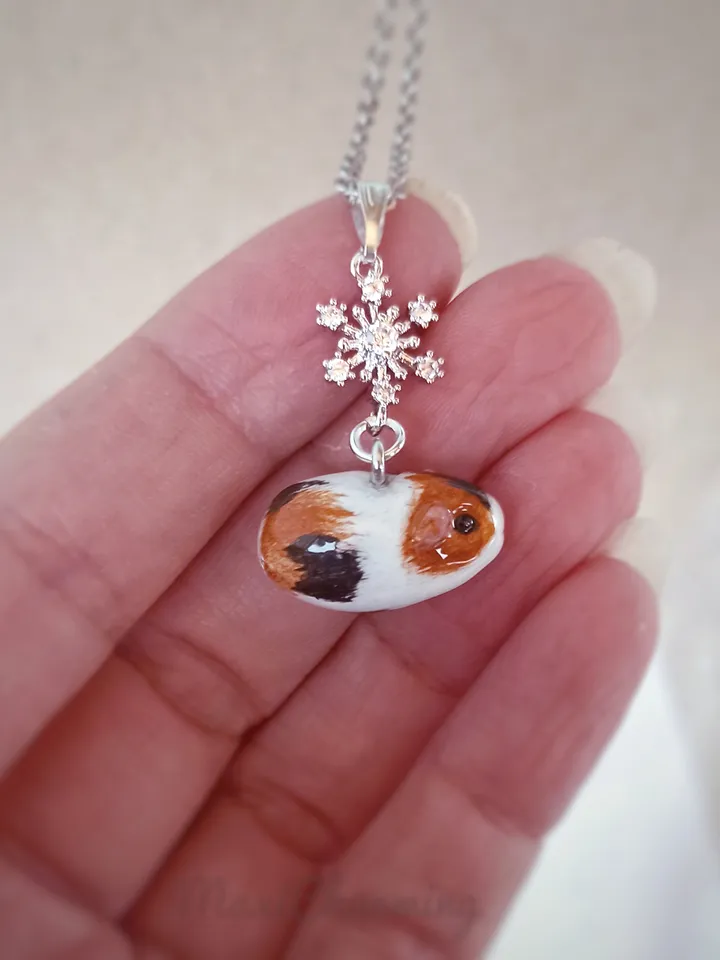 a Handmade guinea pig necklace rundom color  (pre-order)