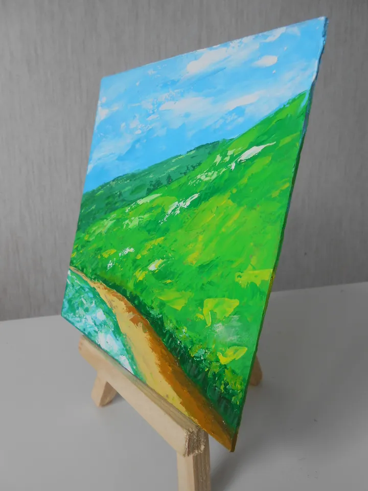 Mountains by the lake. Bright landscape with oil paints.