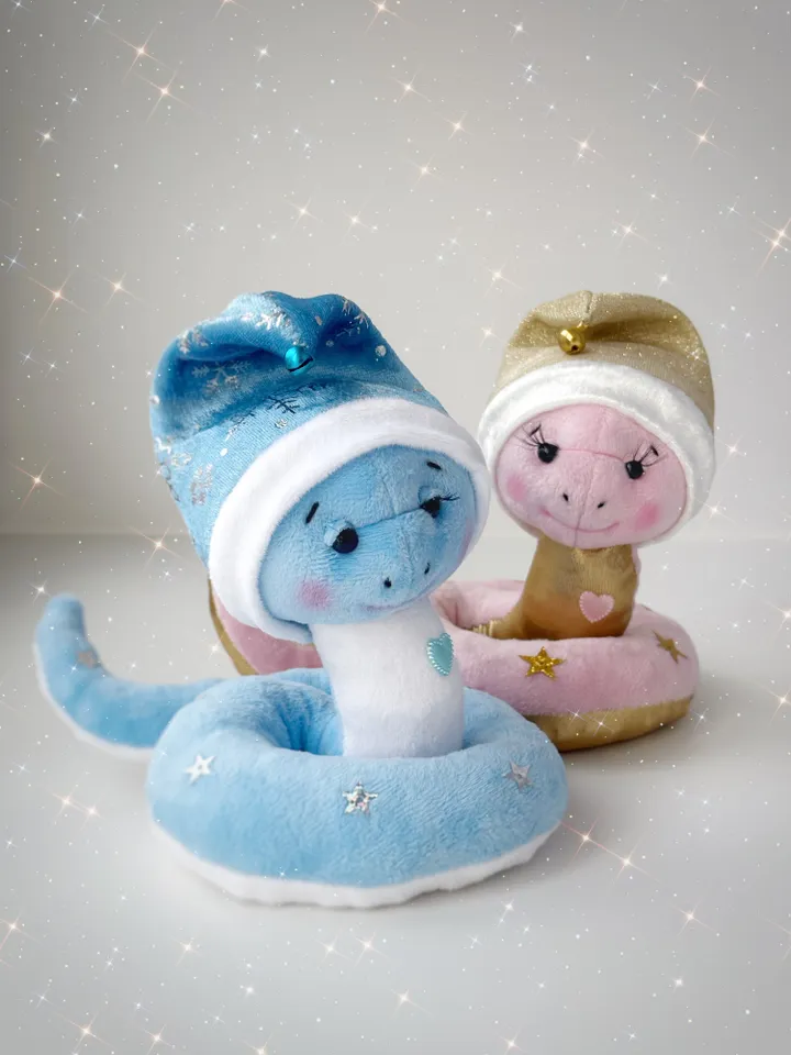 Christmas plush snakes. Handmade cute snakes in holiday hat for home decor. Christmas snakes for gift.