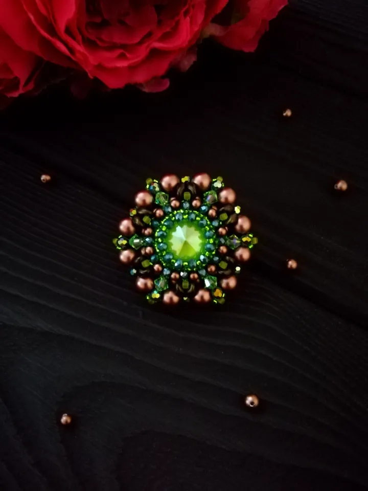 Green round bead brooch