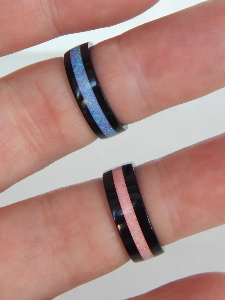 Stylish black ring. Carbon ring with synthetic opal. 5 3/4