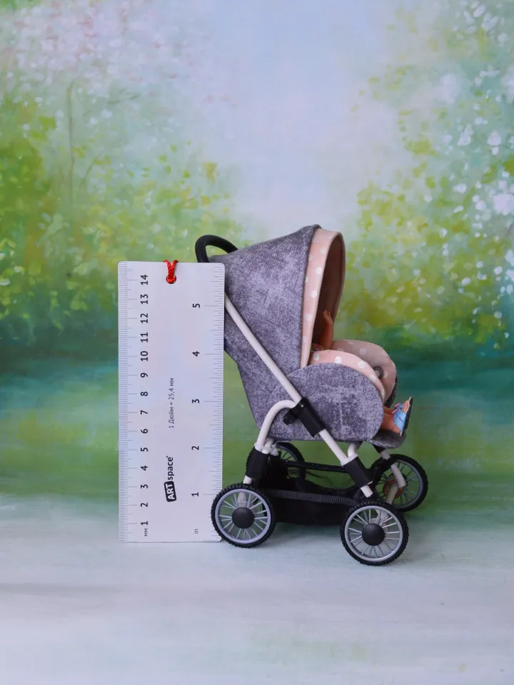 Miniature toy stroller for dolls in 1/6 scale. Accessories for small dolls and poupins. Pram for Barbie doll.