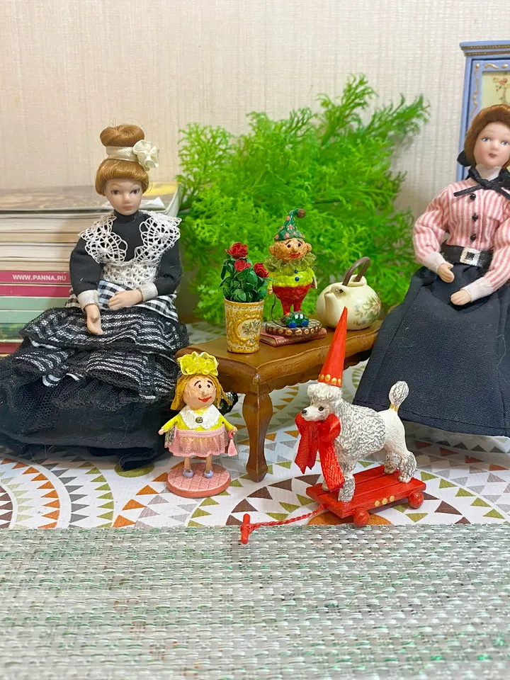 Poodle on a cart. Doll toy. Scale 1:12.