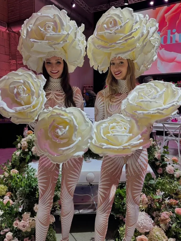 A set of headdress and roses on hands, roses on the head, a headdress from roses, a burning man, festival clothing, a suit for the show,set