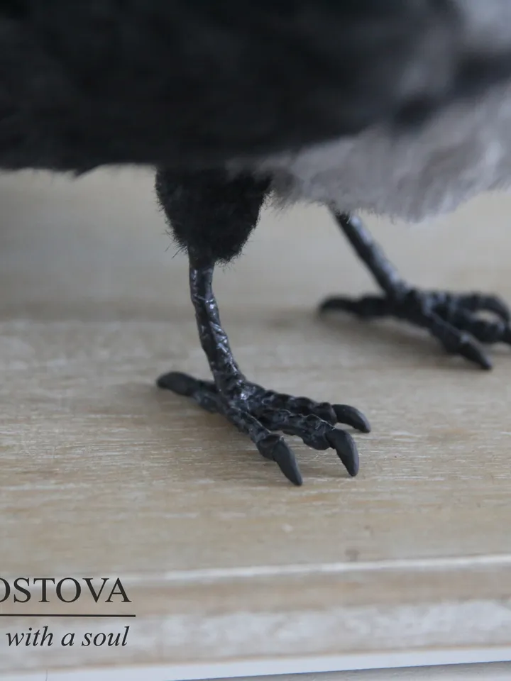 Grey crow with cheese realistic plush toy.