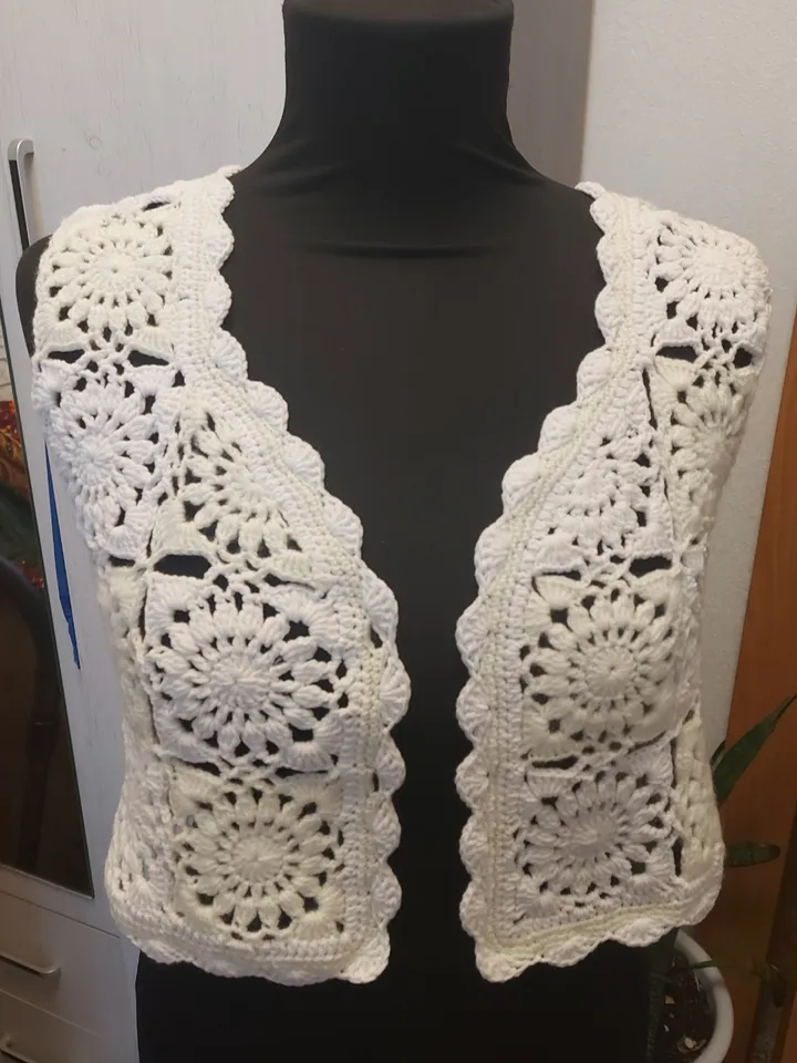 Handmade vest from granny square in boho and retro style