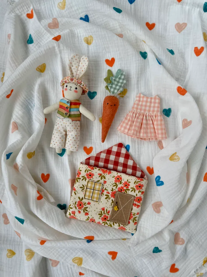 Sewing pattern hare with clothes and house