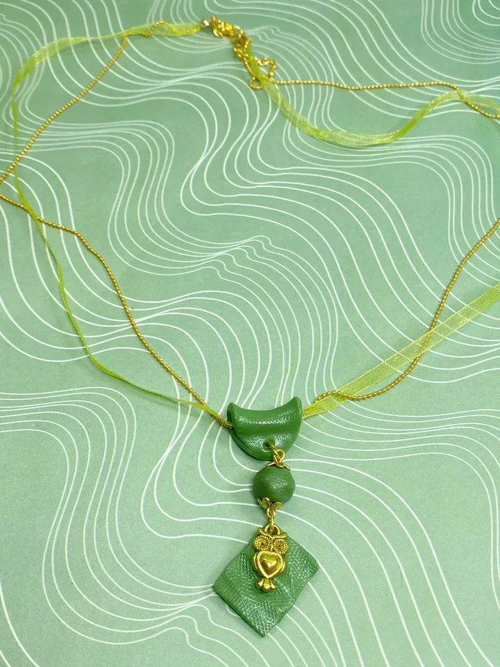 Handmade pendant on a chain. Handmade jewelry.