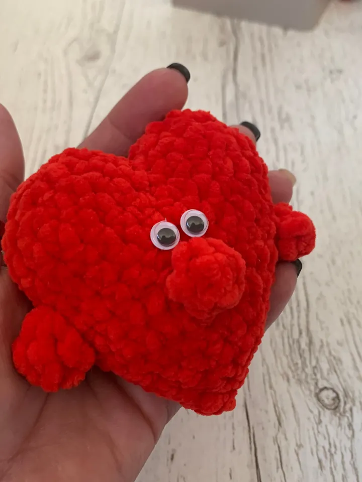 Crochet red plush heart in mask personalised gift, small stuffed ornament, funny keychain Valentine’s Day, pendant on a car
