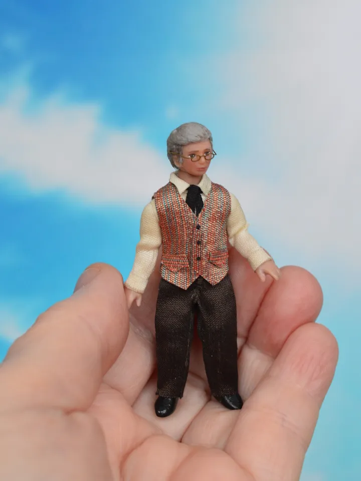 Man doll in 1/24 scale. Miniature doll for a dollhouse.