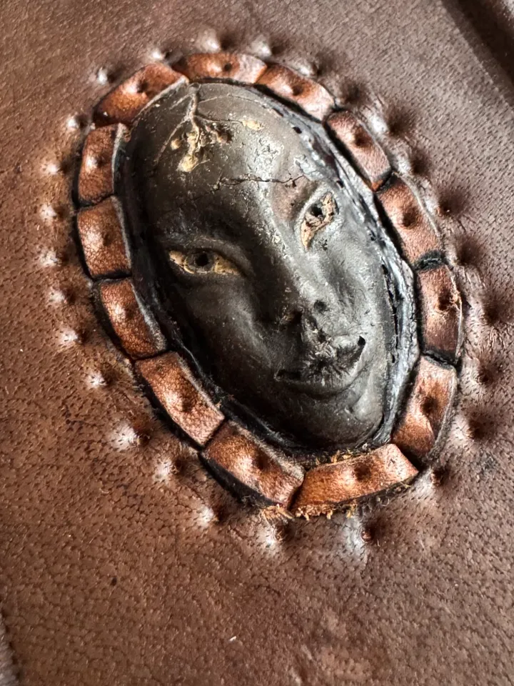 Leather notebook with mask